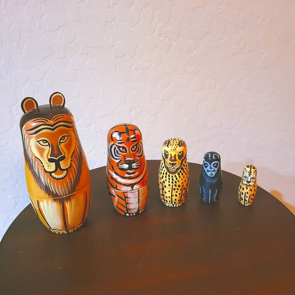 Rare collection of tiger themed wooden nesting dolls animals